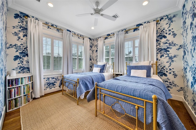 811 Byrne St, Houston, TX 77009 - bedroom with crown molding, wood finished floors, wallpapered walls, recessed lighting, and a ceiling fan
