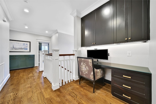 811 Byrne St, Houston, TX 77009 - home office with crown molding, wood finished floors, and recessed lighting