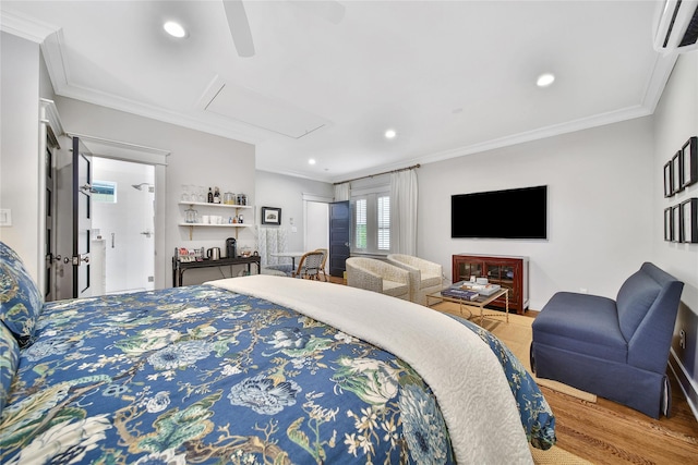 811 Byrne St, Houston, TX 77009 - bedroom with a wall unit AC, wood finished floors, crown molding, recessed lighting, and ceiling fan