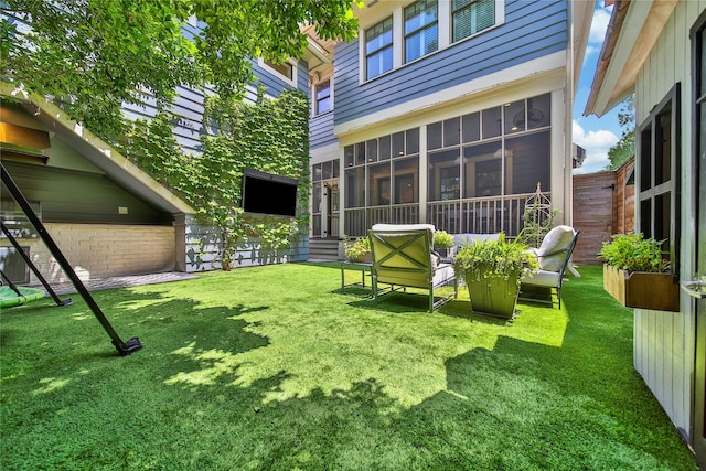 811 Byrne St, Houston, TX 77009 - view of green lawn featuring a sunroom