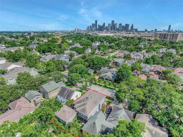 811 Byrne St, Houston, TX 77009 - aerial perspective of suburban area with skyline and property parcel outlined