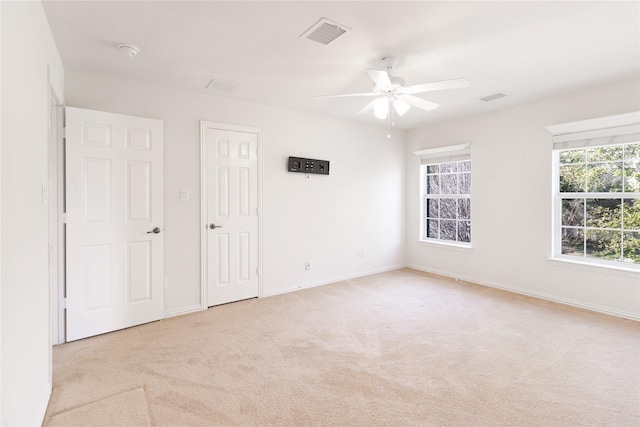 7611 Highmeadow Dr, Houston, TX 77063 - unfurnished bedroom featuring light carpet and ceiling fan