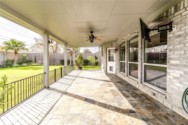 7611 Highmeadow Dr, Houston, TX 77063 - fenced backyard with a ceiling fan and a patio area