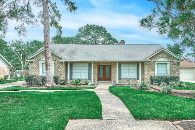 15402 Ripplestream, Houston, TX 77068 - ranch-style house with french doors, brick siding, a front yard, a chimney, and roof with shingles
