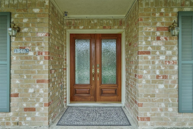 15402 Ripplestream, Houston, TX 77068 - property entrance with french doors and brick siding