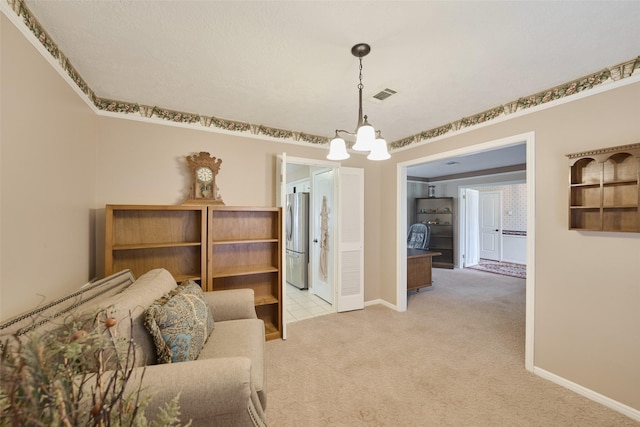 15402 Ripplestream, Houston, TX 77068 - living room with light carpet and a chandelier