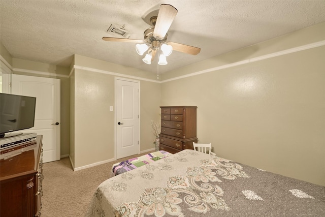 15402 Ripplestream, Houston, TX 77068 - carpeted bedroom featuring a textured ceiling and a ceiling fan