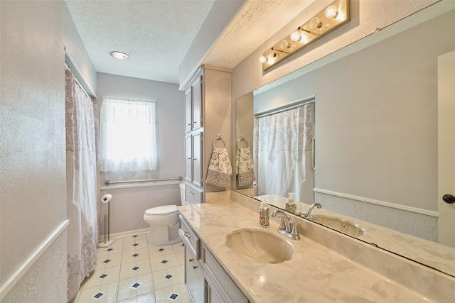 15402 Ripplestream, Houston, TX 77068 - full bathroom with vanity, a textured ceiling, a shower with shower curtain, and tile patterned floors