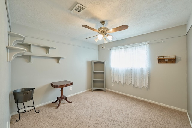 15402 Ripplestream, Houston, TX 77068 - spare room featuring ceiling fan, carpet floors, and a textured ceiling
