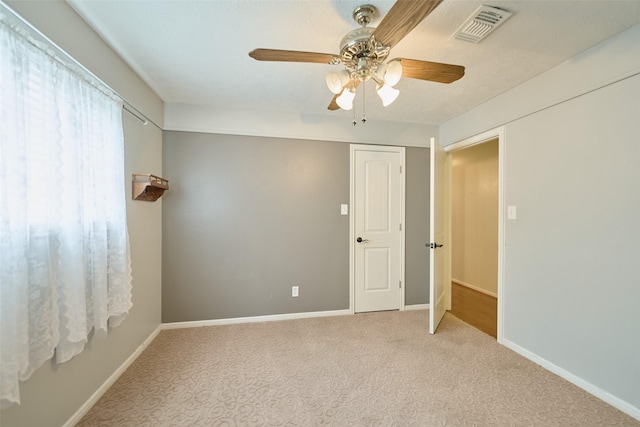 15402 Ripplestream, Houston, TX 77068 - carpeted spare room with a ceiling fan and baseboards