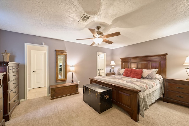 15402 Ripplestream, Houston, TX 77068 - bedroom with light colored carpet, ceiling fan, a textured ceiling, and ensuite bath