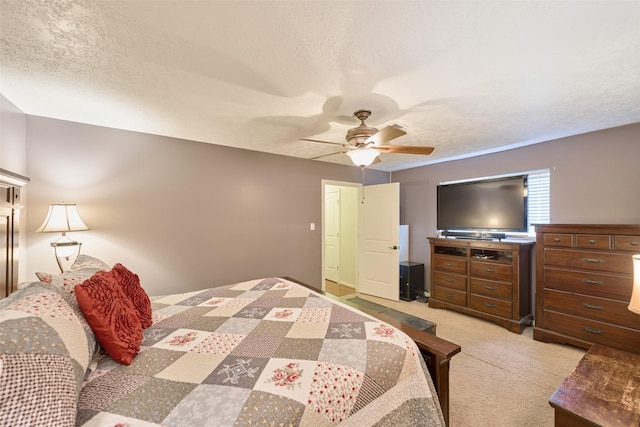 15402 Ripplestream, Houston, TX 77068 - bedroom featuring light carpet, a textured ceiling, and a ceiling fan