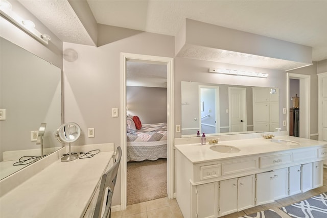 15402 Ripplestream, Houston, TX 77068 - ensuite bathroom featuring double vanity and tile patterned flooring