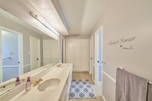 15402 Ripplestream, Houston, TX 77068 - full bathroom with double vanity and tile patterned flooring