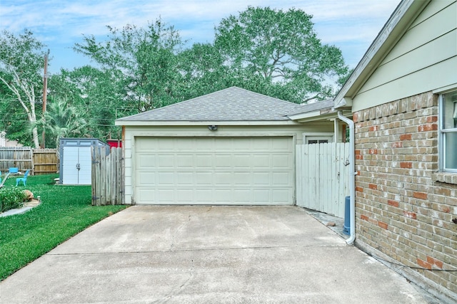 15402 Ripplestream, Houston, TX 77068 - garage with driveway and a storage unit