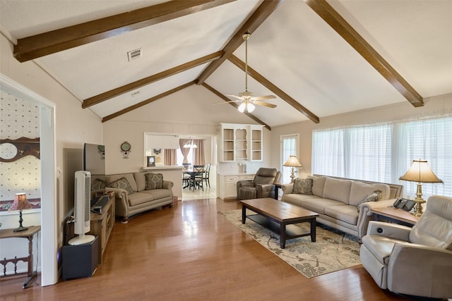 15402 Ripplestream, Houston, TX 77068 - living room with wood finished floors, ceiling fan, and healthy amount of natural light