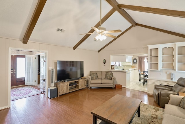 15402 Ripplestream, Houston, TX 77068 - living room with healthy amount of natural light, wood finished floors, and ceiling fan