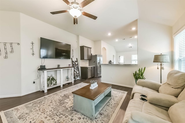 16107 Dockside St, Crosby, TX 77532 - living room with a ceiling fan, dark wood-style flooring, recessed lighting, and arched walkways