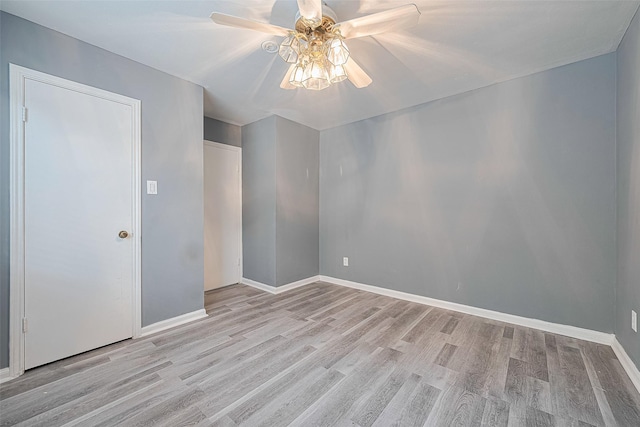 17207 Meadow Butte Dr, Houston, TX 77090 - empty room with a ceiling fan and wood finished floors