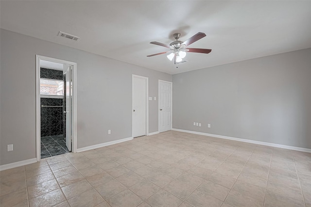 17207 Meadow Butte Dr, Houston, TX 77090 - unfurnished bedroom with a ceiling fan and connected bathroom