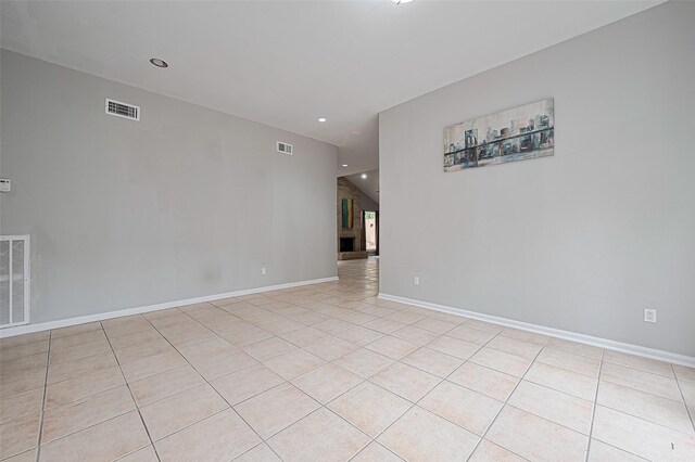 17207 Meadow Butte Dr, Houston, TX 77090 - spare room featuring light tile patterned floors and recessed lighting