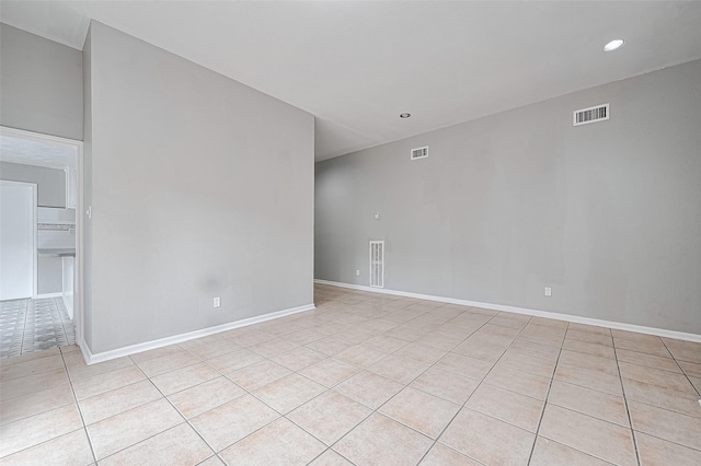 17207 Meadow Butte Dr, Houston, TX 77090 - spare room with light tile patterned floors and recessed lighting