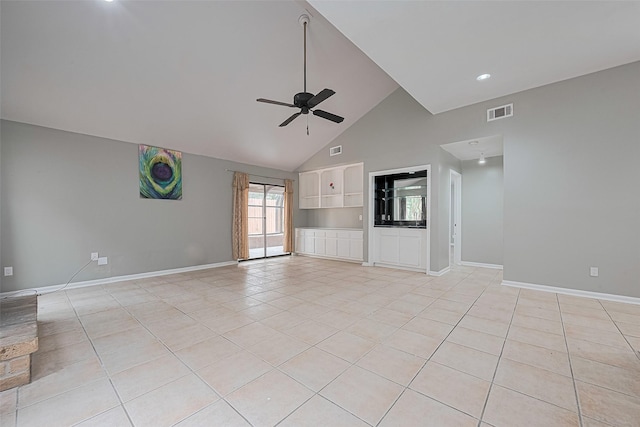 17207 Meadow Butte Dr, Houston, TX 77090 - unfurnished living room with a ceiling fan, light tile patterned flooring, and high vaulted ceiling