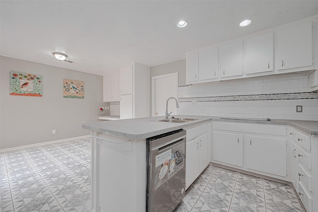 17207 Meadow Butte Dr, Houston, TX 77090 - kitchen with dishwasher, light countertops, decorative backsplash, a peninsula, and recessed lighting