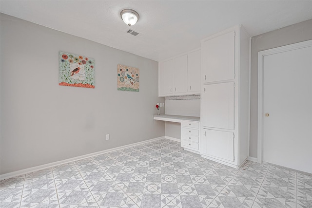 17207 Meadow Butte Dr, Houston, TX 77090 - unfurnished office featuring built in study area and baseboards