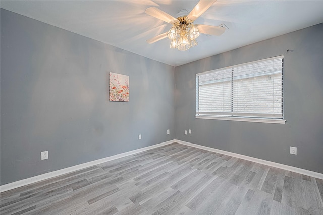 17207 Meadow Butte Dr, Houston, TX 77090 - empty room with a ceiling fan and wood finished floors
