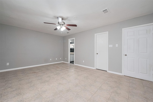 17207 Meadow Butte Dr, Houston, TX 77090 - empty room with ceiling fan and baseboards