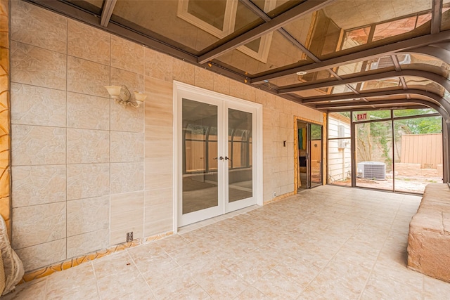 17207 Meadow Butte Dr, Houston, TX 77090 - unfurnished sunroom featuring french doors