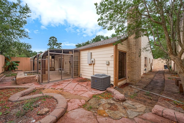 17207 Meadow Butte Dr, Houston, TX 77090 - view of outdoor structure featuring a sunroom