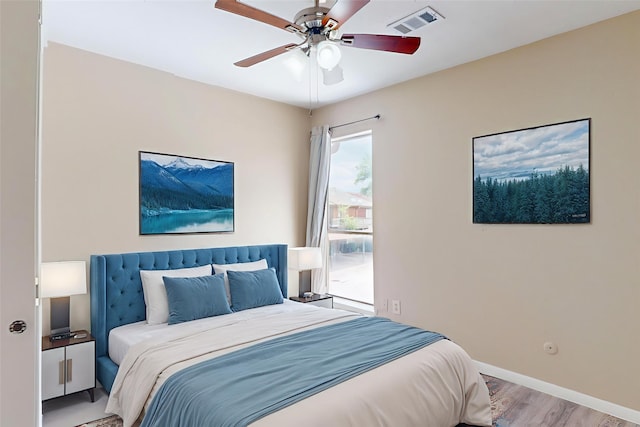 7840 Bateman Ln, Houston, TX 77088 - bedroom with light wood-style floors and ceiling fan