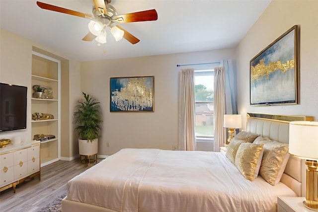 7840 Bateman Ln, Houston, TX 77088 - bedroom with light wood-style floors and ceiling fan
