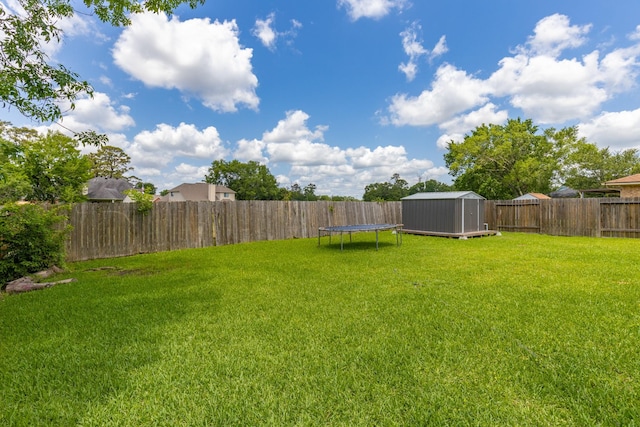 454 Fishhawk Way, Crosby, TX 77532 - fenced backyard featuring a shed