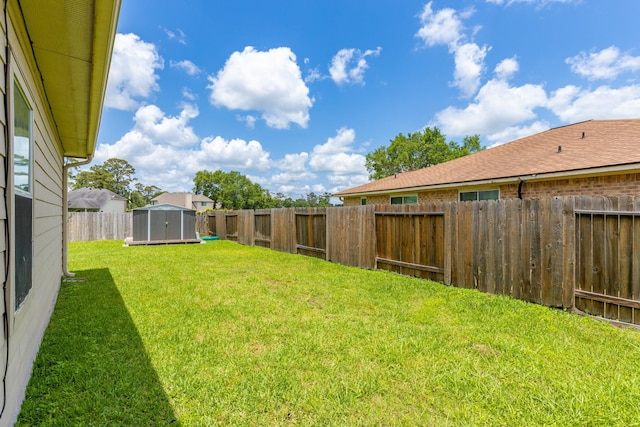 454 Fishhawk Way, Crosby, TX 77532 - fenced backyard featuring a storage shed