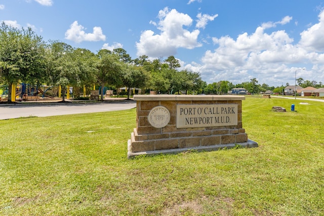 454 Fishhawk Way, Crosby, TX 77532 - community / neighborhood sign featuring a lawn