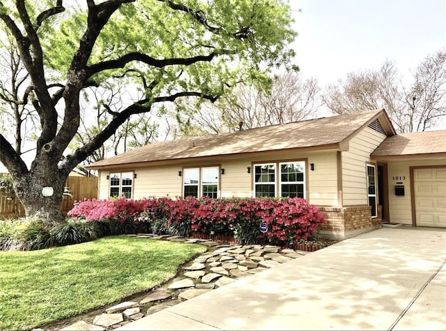 1813 Huge Oaks St, Houston, TX 77055 - view of front of house featuring a garage, brick siding, and concrete driveway
