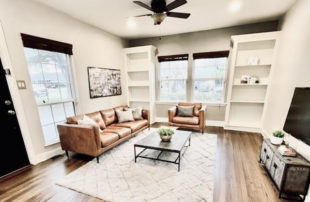 1813 Huge Oaks St, Houston, TX 77055 - living room with wood finished floors and a ceiling fan