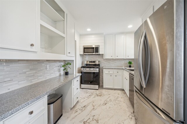 1813 Huge Oaks St, Houston, TX 77055 - kitchen with stainless steel appliances, open shelves, backsplash, white cabinets, and light marble finish flooring