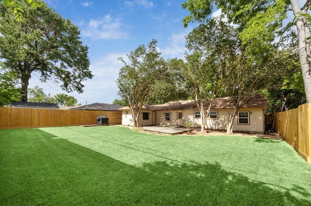 1813 Huge Oaks St, Houston, TX 77055 - rear view of house featuring a fenced backyard and a patio area