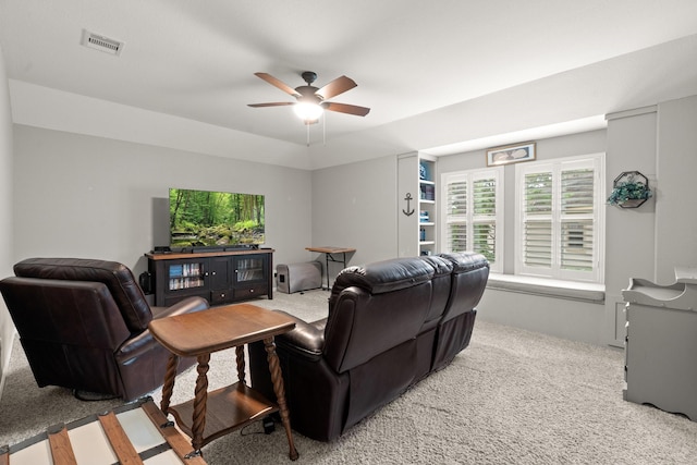266 Tortoise Creek Pl, The Woodlands, TX 77389 - living area featuring carpet floors, a ceiling fan, and plenty of natural light