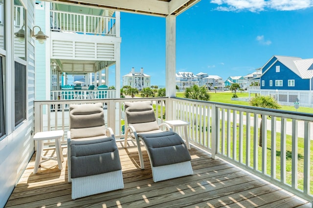 3806 Abalone Rd, Galveston, TX 77554 - wooden terrace with a residential view