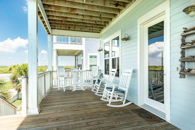 3806 Abalone Rd, Galveston, TX 77554 - view of wooden porch