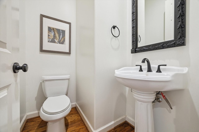 5200 Jackson St, Houston, TX 77004 - half bathroom featuring wood finished floors and toilet