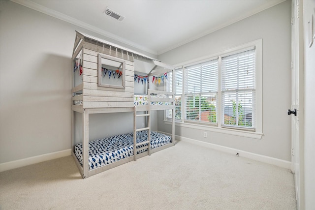 5200 Jackson St, Houston, TX 77004 - carpeted bedroom featuring crown molding and baseboards