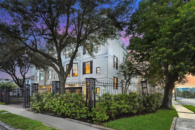 5200 Jackson St, Houston, TX 77004 - view of property with a fenced front yard, stucco siding, and a gate