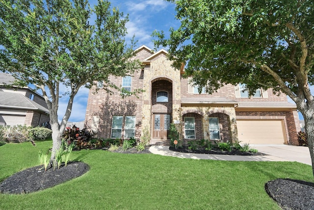 9003 Alps Peak Ct, Richmond, TX 77407 - view of front of property with brick siding, driveway, a front yard, and a garage