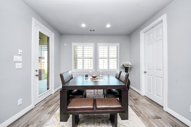 9003 Alps Peak Ct, Richmond, TX 77407 - dining room featuring light wood-style flooring and recessed lighting